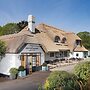 The Potter's Heron - A Heartwood Inn