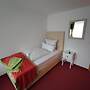 Room in Guest Room - Comfortable Single Room With Shared Bathroom and 