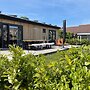 Chalet by Water in Idskenhuizen Recreation Park