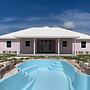 Twin Coves Tranquility: Private Beachfront Estate