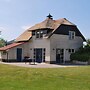 Thatched Villa With Bath in a Holiday Park