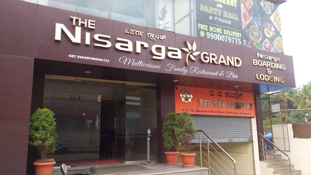 the Nisarga Grand   boarding & lodging
