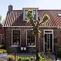 Atmospheric Wadden Houses Located Next to Each Other Near the Wadden S