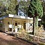 A Detached Bungalow With Outdoor Fireplace, Covered Terrace and Pond i
