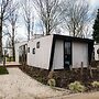 Modern Chalet by the River Maas