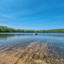 Deck + Beach Access: Lakefront Cabin in Levering!