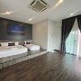 Capital O 91170 Kurau Bay Hotel