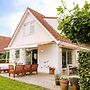 Nice Holiday Home on the Water in Grou