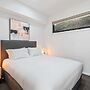 Comfortable 2BR Retreat With Balcony & Parking
