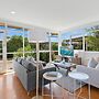 Spacious Coastal 4-bed Steps From the Sand