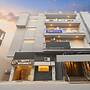 Fabhotel Happy Residency