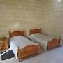 Cauchi corner house with roof top pool