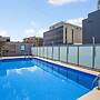 Chic Studio With a Pool and Moments From Shop