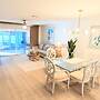 Retro Coastal Fort Myers Retreat Spa Fire Pit
