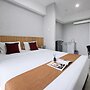 Classic And Homey Gray Studio At Apartment The Ayoma
