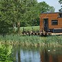 Tiny House by the Pond: Terrace, Barbecue, Outdoor Fireplace