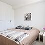 Bright 1BR Apt with Sauna & Balcony