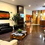 Le Village Flats e Hotel