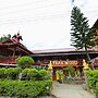 Teak Wood Hotel