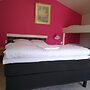 Milano Garden - City Bungalow Hotell, i gränssnittet till Kullabygdens