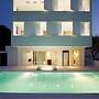 Infinity White Complex by GK Hospitality Group