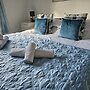 Snug - Meadhan Apartment
