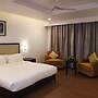 Triguna Clarks Inn