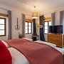 BARONHAUS Aparthotel & Suites