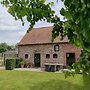 Pleasant Holiday Home in West Flanders with Enclosed Garden & Hot Tub
