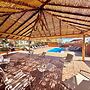 Peumayen Atacama / Hostal & Cabaña