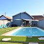 Poolside Escape by Arcachon