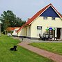 Chalet in Bergumermeer by the Canal