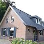 Spacious Farmhouse with Barbecue near Veluwe