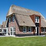 Beautiful, Thatched Villa With a Terrace at the Tjeukemeer