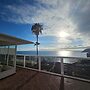 Sunset Balcony With Ocean Views and Pool Access