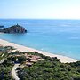 Baia di Chia Resort Sardinia, Curio Collection by Hilton