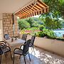 Beachfront Apartment With big Terrace and Garden