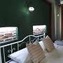 Casa Magnolia Boutique Rooms