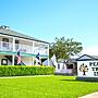 Peach Tree Inn & Suites