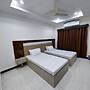 OVERSEAS HOTEL AND SUITES