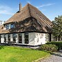 Spacious Holiday Home De Pauwenhof
