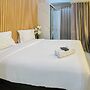 Nice And Cozy Studio At Amartha View Apartment