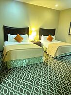 Sunday House Inn and Suites