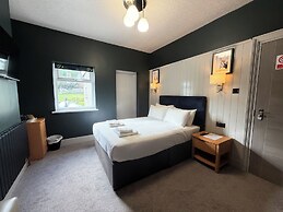 Nomi Rooms and Restaurant