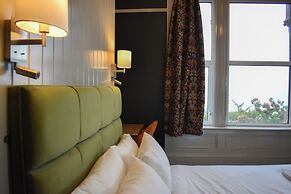 Nomi Rooms and Restaurant
