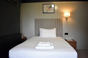 Nomi Rooms and Restaurant