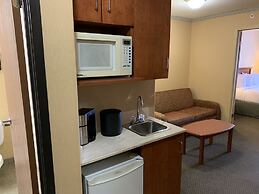Merit Hotel & Suites