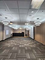 Merit Hotel & Suites