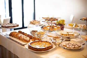 Sardegna Hotel, Suites & Restaurant