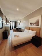 Fira Centric Apartments by gaiarooms